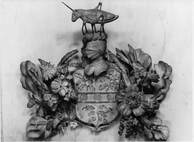 Arms of William Lynnet, by Grinling Gibbons (Wren Library)